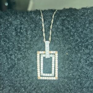 Elegant Gold and Silver Pendant Necklace